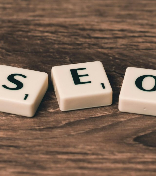 pexels-photo-270637-270637 Scrabble tiles spelling 'SEO' on a wooden surface. Ideal for digital marketing themes.